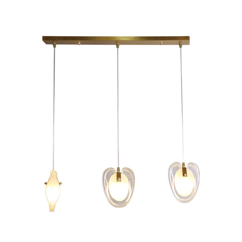 Brass Heart Shape Ceiling Light Modern 3-Light Clear Glass Hanging Lamp Fixture with Linear Canopy Clearhalo 'Ceiling Lights' 'Glass shade' 'Glass' 'Modern Pendants' 'Modern' 'Pendant Lights' 'Pendants' Lighting' 800929