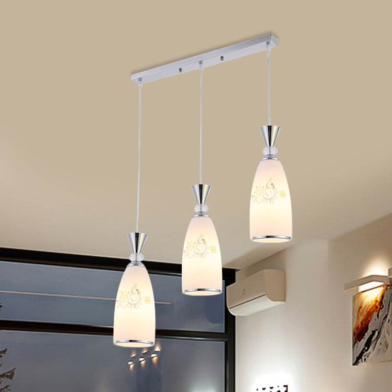 Frosted Glass Teardrop Multi Pendant Light Modernist 3 Bulbs Dining Room Hanging Lamp in White/Black/Chrome Chrome Clearhalo 'Ceiling Lights' 'Pendant Lights' 'Pendants' Lighting' 802221_fb502527-edba-471d-b113-7aa4f14aa1e1