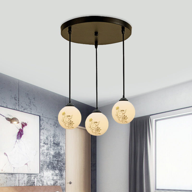 Black Sphere Multi Ceiling Lamp Modernism White Printing Glass 3-Light Dining Room Pendant with Round/Linear Canopy Clearhalo 'Ceiling Lights' 'Close To Ceiling Lights' 'Glass shade' 'Glass' 'Pendant Lights' 'Pendants' Lighting' 802313