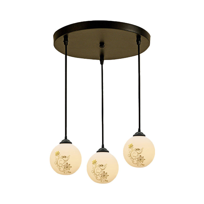 Black Sphere Multi Ceiling Lamp Modernism White Printing Glass 3-Light Dining Room Pendant with Round/Linear Canopy Clearhalo 'Ceiling Lights' 'Close To Ceiling Lights' 'Glass shade' 'Glass' 'Pendant Lights' 'Pendants' Lighting' 802314
