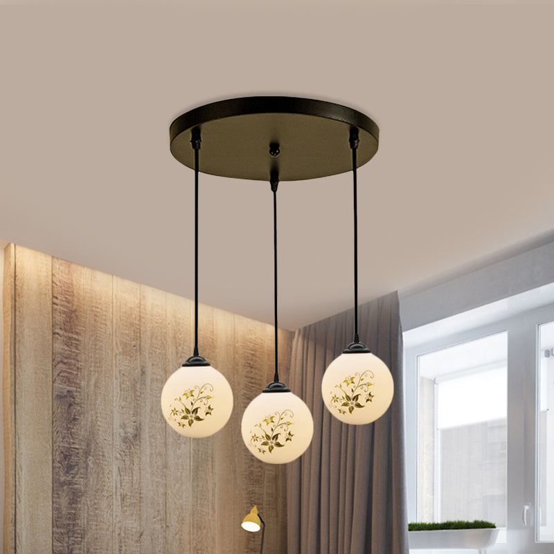 Black Sphere Multi Ceiling Lamp Modernism White Printing Glass 3-Light Dining Room Pendant with Round/Linear Canopy Clearhalo 'Ceiling Lights' 'Close To Ceiling Lights' 'Glass shade' 'Glass' 'Pendant Lights' 'Pendants' Lighting' 802317