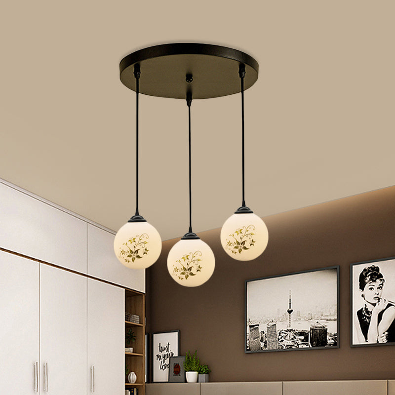 Black Sphere Multi Ceiling Lamp Modernism White Printing Glass 3-Light Dining Room Pendant with Round/Linear Canopy Clearhalo 'Ceiling Lights' 'Close To Ceiling Lights' 'Glass shade' 'Glass' 'Pendant Lights' 'Pendants' Lighting' 802318