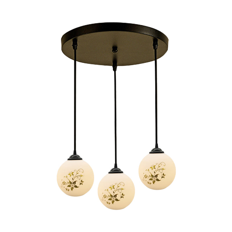 Black Sphere Multi Ceiling Lamp Modernism White Printing Glass 3-Light Dining Room Pendant with Round/Linear Canopy Clearhalo 'Ceiling Lights' 'Close To Ceiling Lights' 'Glass shade' 'Glass' 'Pendant Lights' 'Pendants' Lighting' 802319