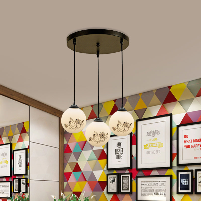 Black Sphere Multi Ceiling Lamp Modernism White Printing Glass 3-Light Dining Room Pendant with Round/Linear Canopy Clearhalo 'Ceiling Lights' 'Close To Ceiling Lights' 'Glass shade' 'Glass' 'Pendant Lights' 'Pendants' Lighting' 802322