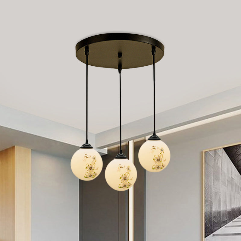 Black Sphere Multi Ceiling Lamp Modernism White Printing Glass 3-Light Dining Room Pendant with Round/Linear Canopy Clearhalo 'Ceiling Lights' 'Close To Ceiling Lights' 'Glass shade' 'Glass' 'Pendant Lights' 'Pendants' Lighting' 802325