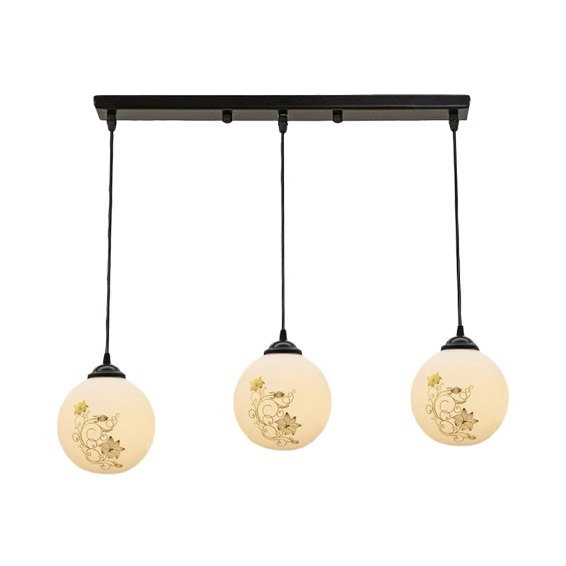 Black Sphere Multi Ceiling Lamp Modernism White Printing Glass 3-Light Dining Room Pendant with Round/Linear Canopy Clearhalo 'Ceiling Lights' 'Close To Ceiling Lights' 'Glass shade' 'Glass' 'Pendant Lights' 'Pendants' Lighting' 802331