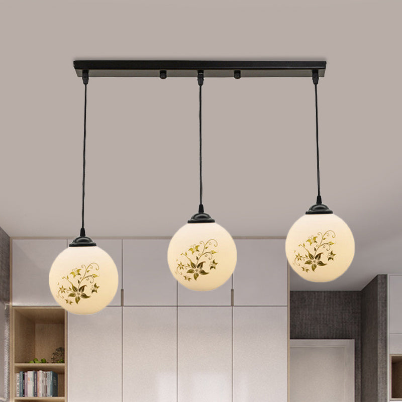 Black Sphere Multi Ceiling Lamp Modernism White Printing Glass 3-Light Dining Room Pendant with Round/Linear Canopy White A Linear Clearhalo 'Ceiling Lights' 'Close To Ceiling Lights' 'Glass shade' 'Glass' 'Pendant Lights' 'Pendants' Lighting' 802333