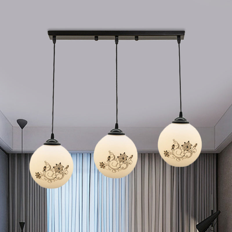 Black Sphere Multi Ceiling Lamp Modernism White Printing Glass 3-Light Dining Room Pendant with Round/Linear Canopy White D Linear Clearhalo 'Ceiling Lights' 'Close To Ceiling Lights' 'Glass shade' 'Glass' 'Pendant Lights' 'Pendants' Lighting' 802337