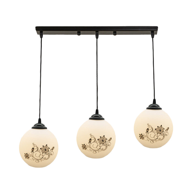 Black Sphere Multi Ceiling Lamp Modernism White Printing Glass 3-Light Dining Room Pendant with Round/Linear Canopy Clearhalo 'Ceiling Lights' 'Close To Ceiling Lights' 'Glass shade' 'Glass' 'Pendant Lights' 'Pendants' Lighting' 802340