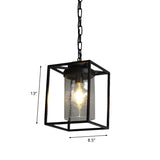 Antique Cylinder Hanging Pendant 1 Bulb Clear Seeded Glass Drop Lamp in Black with Rectangle Cage Clearhalo 'Ceiling Lights' 'Glass shade' 'Glass' 'Pendant Lights' 'Pendants' Lighting' 808543