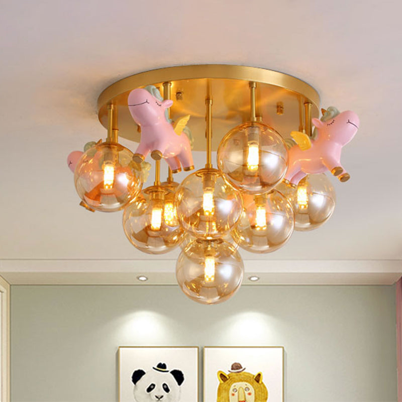 Metal Cartoon Pony Semi-Flush Mount Lamp Macaron 9 Heads Gold Ceiling Light Fixture with Globe Amber Glass Shade Clearhalo 'Ceiling Lights' 'Close To Ceiling Lights' 'Close to ceiling' 'Semi-flushmount' Lighting' 809989