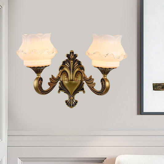 Vintage Curved Arm Wall Lighting Idea 1/2-Bulb Metallic Wall Mounted Lamp in Brass with Flower Milk Glass Shade Clearhalo 'Wall Lamps & Sconces' 'Wall Lights' Lighting' 810183