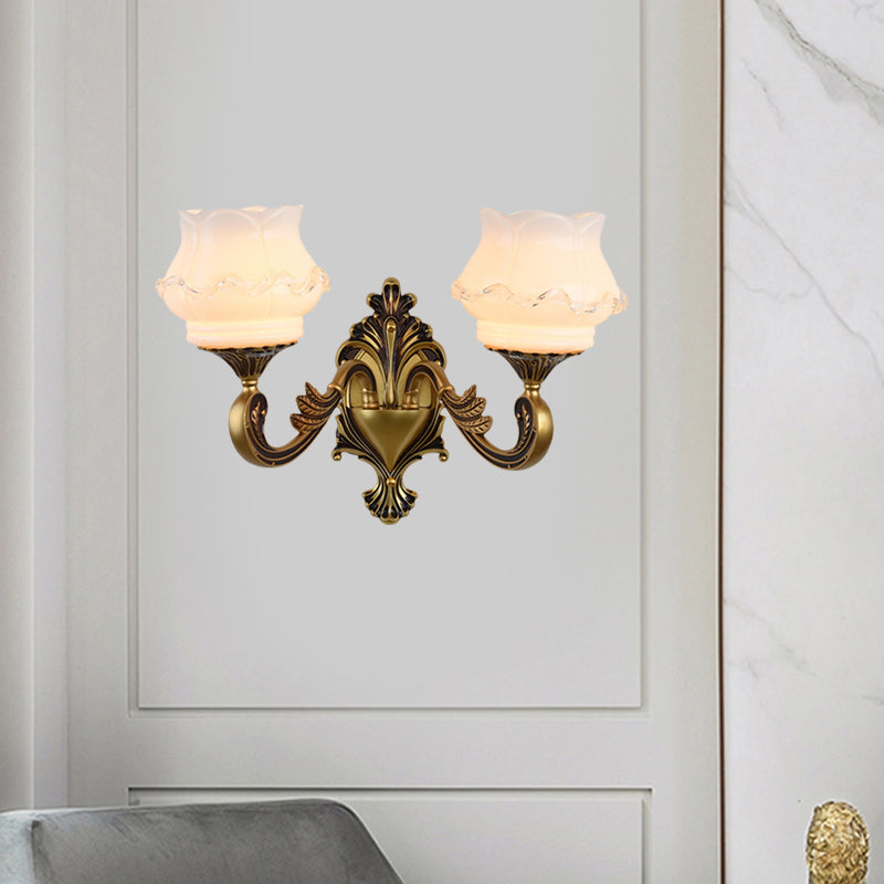 Vintage Curved Arm Wall Lighting Idea 1/2-Bulb Metallic Wall Mounted Lamp in Brass with Flower Milk Glass Shade Clearhalo 'Wall Lamps & Sconces' 'Wall Lights' Lighting' 810184