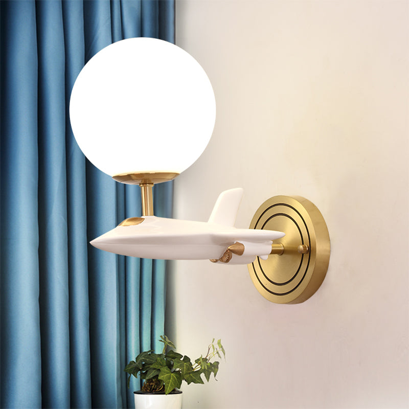 Kids Spaceship Shape Base Gold Wall Light Fixture 1/2 Bulbs Sconce Light with Globe Cream Glass Shade in White and Gold 1.0 White-Gold Clearhalo 'Wall Lamps & Sconces' 'Wall Lights' Lighting' 811494