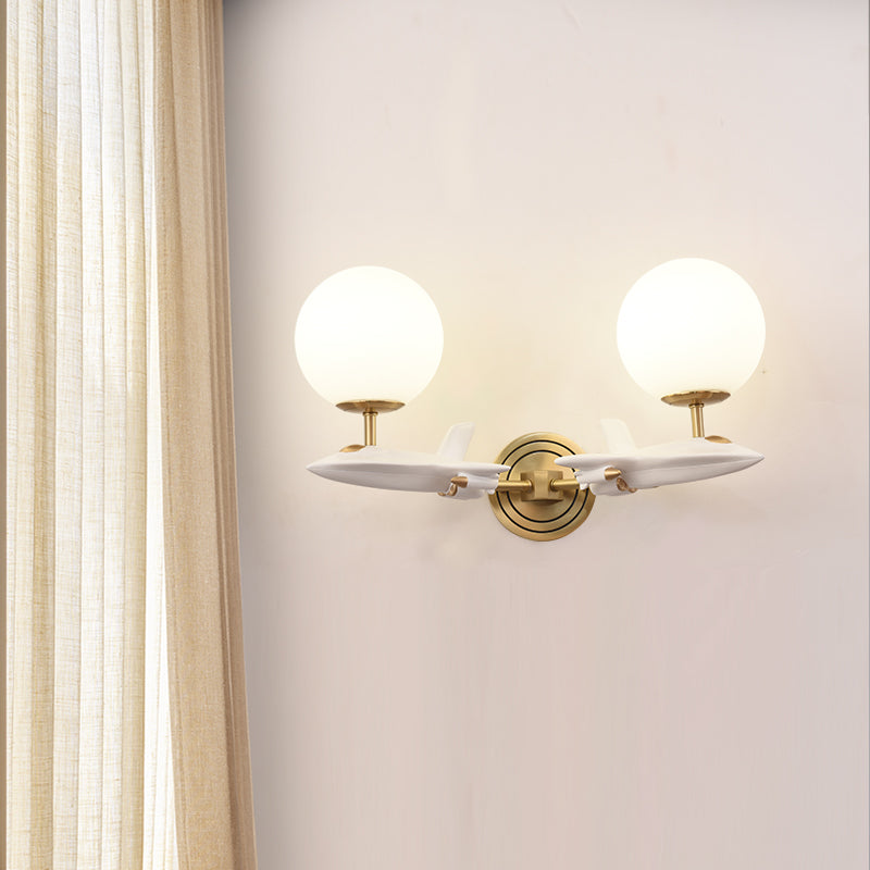 Kids Spaceship Shape Base Gold Wall Light Fixture 1/2 Bulbs Sconce Light with Globe Cream Glass Shade in White and Gold Clearhalo 'Wall Lamps & Sconces' 'Wall Lights' Lighting' 811499