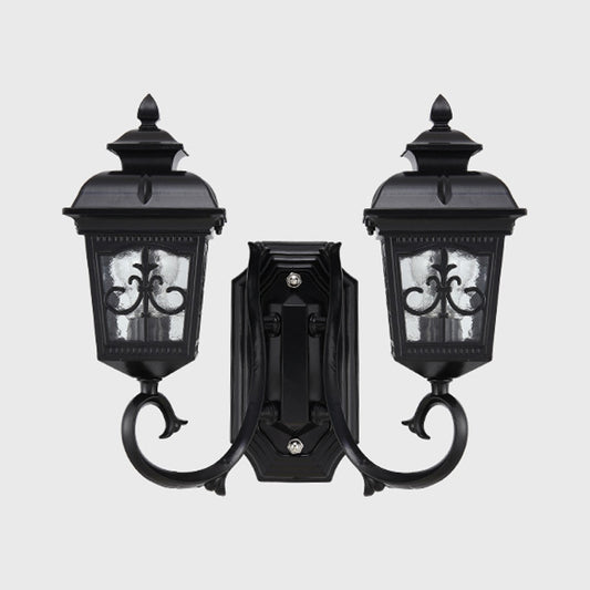 2 Bulbs Lantern Wall Mount Lighting Vintage Black Finish Clear Glass Wall Light Fixture with Curved Arm Clearhalo 'Wall Lamps & Sconces' 'Wall Lights' Lighting' 815072