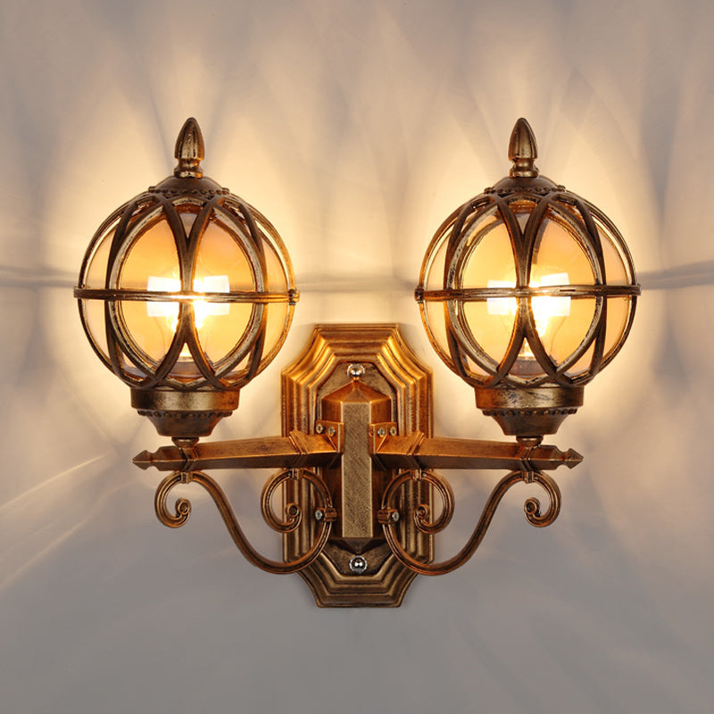 Black/Bronze Spherical Wall Lighting Ideas Country Amber Glass 2-Bulb Patio Surface Wall Sconce with Cage Clearhalo 'Wall Lamps & Sconces' 'Wall Lights' Lighting' 815076