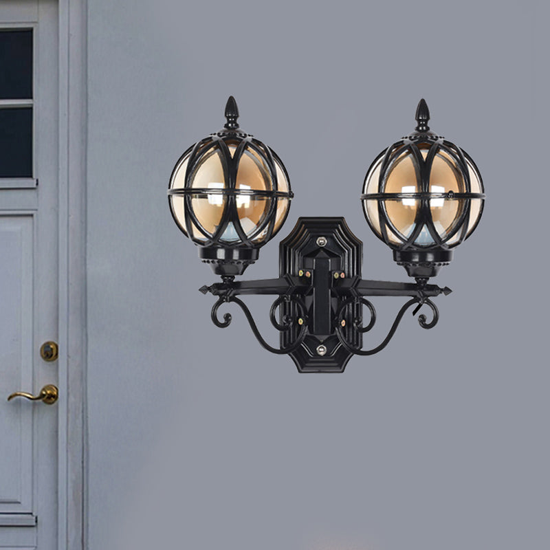 Black/Bronze Spherical Wall Lighting Ideas Country Amber Glass 2-Bulb Patio Surface Wall Sconce with Cage Clearhalo 'Wall Lamps & Sconces' 'Wall Lights' Lighting' 815079