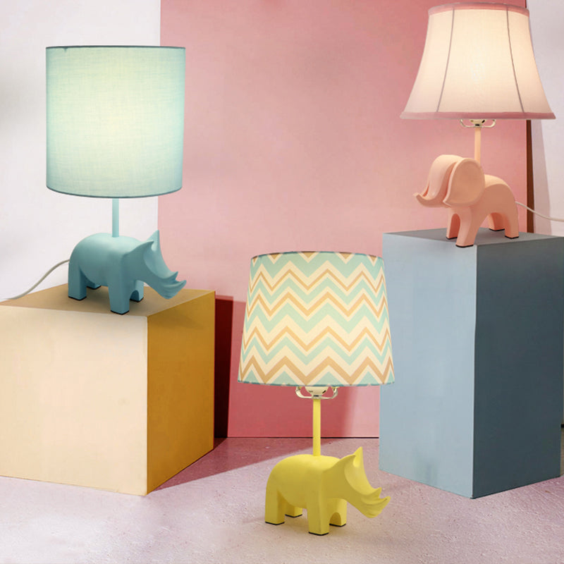 Cartoon 1 Bulb Table Lamp Pink Elephant/Peacock Blue/Yellow Rhinoceros Nightstand Light with Drum/Flared/Chevron Fabric Shade Clearhalo 'Lamps' 'Table Lamps' Lighting' 818679