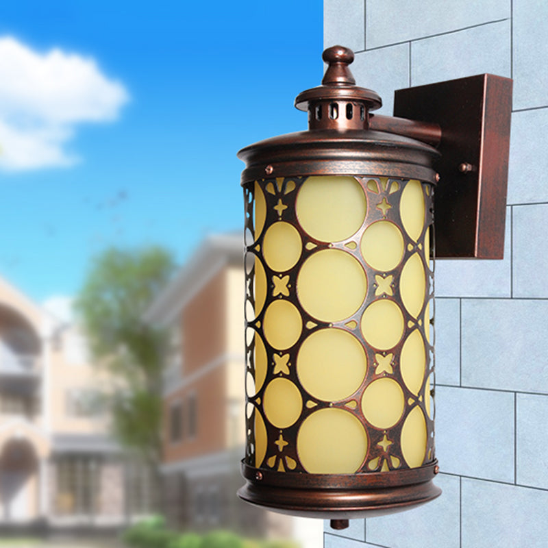 Rural Cylinder Wall Sconce Lamp Single Light Yellow Glass Wall Light in Bronze with Circle Design Clearhalo 'Wall Lamps & Sconces' 'Wall Lights' Lighting' 819869