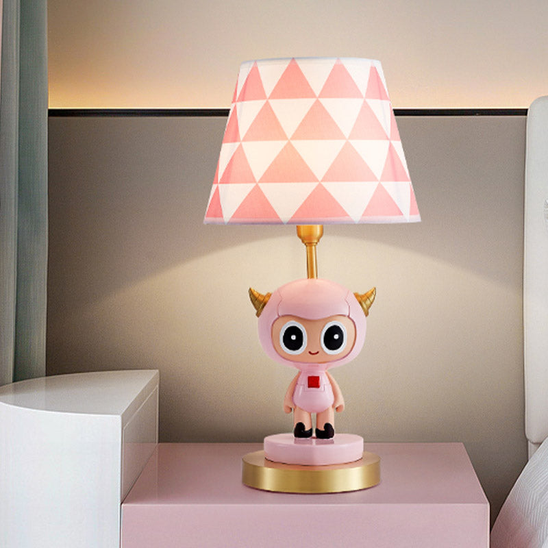Cartoon Cow Boy Resin Night Lamp 1-Light Table Lighting with Triangle Print Shade in Pink/Blue Pink Clearhalo 'Lamps' 'Table Lamps' Lighting' 863681