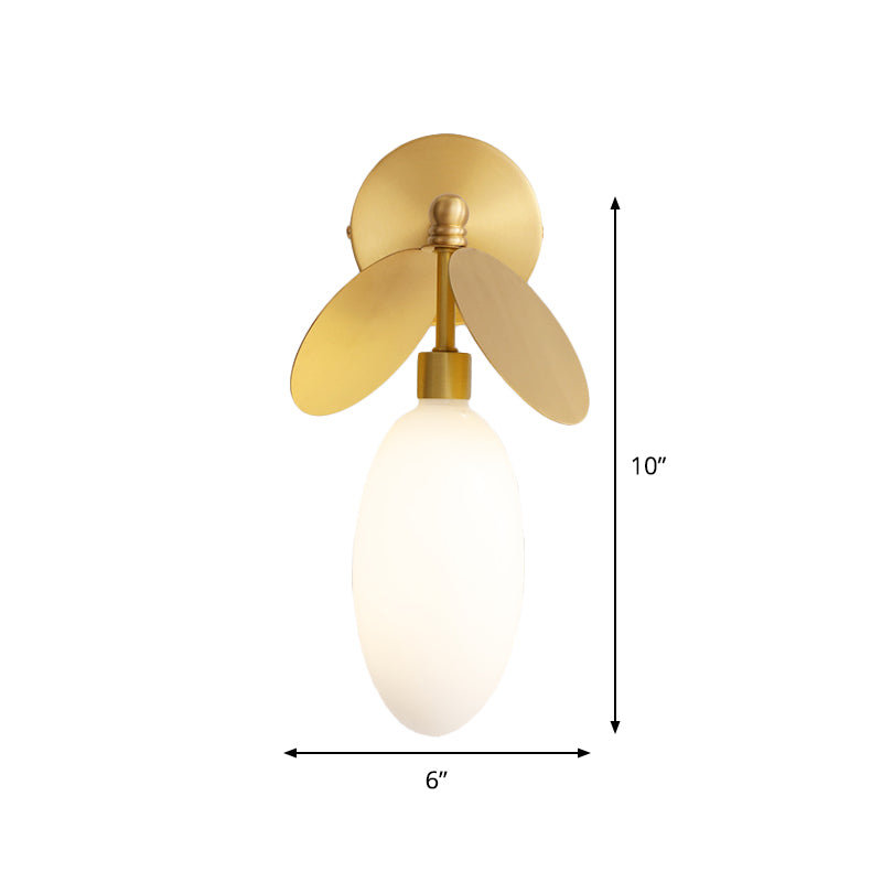 Post Modern Globe/Oval Wall Mount Lamp Cream Glass 1 Light Bedside Wall Light in Brass with Leaf Deco Clearhalo 'Cast Iron' 'Glass' 'Industrial' 'Modern wall lights' 'Modern' 'Tiffany' 'Traditional wall lights' 'Wall Lamps & Sconces' 'Wall Lights' Lighting' 875291