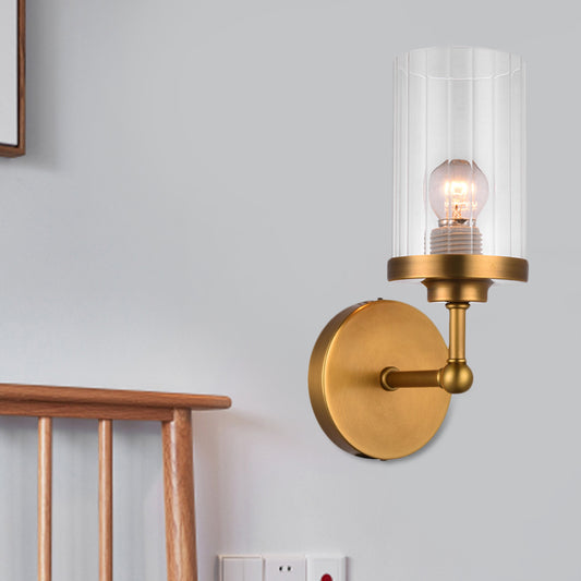 Brass Cylinder Wall Lighting Idea Postmodern 1-Head Clear Ribbed Glass Wall Mount Lamp Brass Clearhalo 'Cast Iron' 'Glass' 'Industrial' 'Modern wall lights' 'Modern' 'Tiffany' 'Traditional wall lights' 'Wall Lamps & Sconces' 'Wall Lights' Lighting' 875316