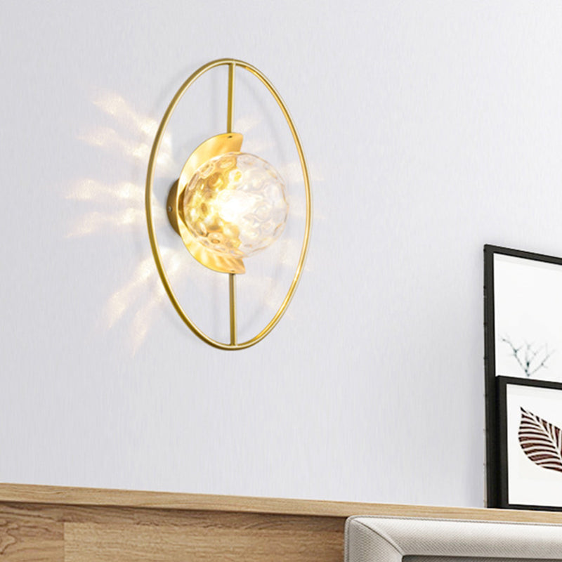Clear Dimpled Glass Orb Sconce Lamp Modern 1-Bulb Black/Gold Wall Light Fixture with Ring Detail Gold Clearhalo 'Cast Iron' 'Glass' 'Industrial' 'Modern wall lights' 'Modern' 'Tiffany' 'Traditional wall lights' 'Wall Lamps & Sconces' 'Wall Lights' Lighting' 875320