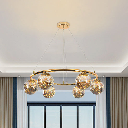 Smoke Gray Glass Ball Ceiling Chandelier Modernist 6 Heads Brass Ring Hanging Lighting with Glowworm Design Inside Smoke Gray Clearhalo 'Ceiling Lights' 'Chandeliers' 'Modern Chandeliers' 'Modern' Lighting' 875467