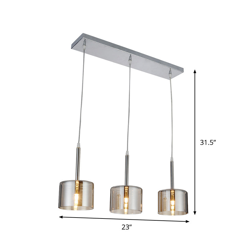 3-Bulb Restaurant Multi-Pendant Modernist Chrome Suspension Light with Drum Clear Glass Shade Clearhalo 'Ceiling Lights' 'Close To Ceiling Lights' 'Glass shade' 'Glass' 'Modern Pendants' 'Modern' 'Pendant Lights' 'Pendants' Lighting' 875481