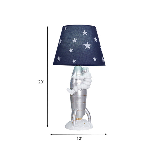 Silver Rocket and Astronaut Table Light Kids 1 Bulb Resin Night Lamp with Barrel Fabric Shade Clearhalo 'Lamps' 'Table Lamps' Lighting' 882748