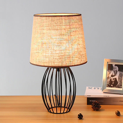 Loft Industrial Tapered Table Lighting 1 Light Fabric Table Lamp with Oval Cage Base in Beige for Coffee Shop Beige Clearhalo 'Lamps' 'Table Lamps' Lighting' 89540