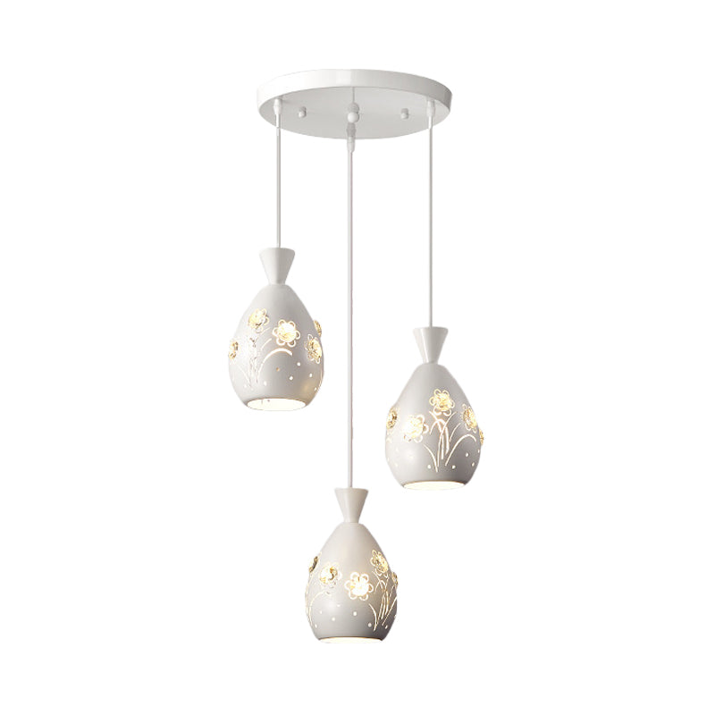 White Wine Can Shape Multi Pendant Modernism 3-Head Iron Hanging Lighting with Laser Cut Flower Design Clearhalo 'Ceiling Lights' 'Modern Pendants' 'Modern' 'Pendant Lights' 'Pendants' Lighting' 897415