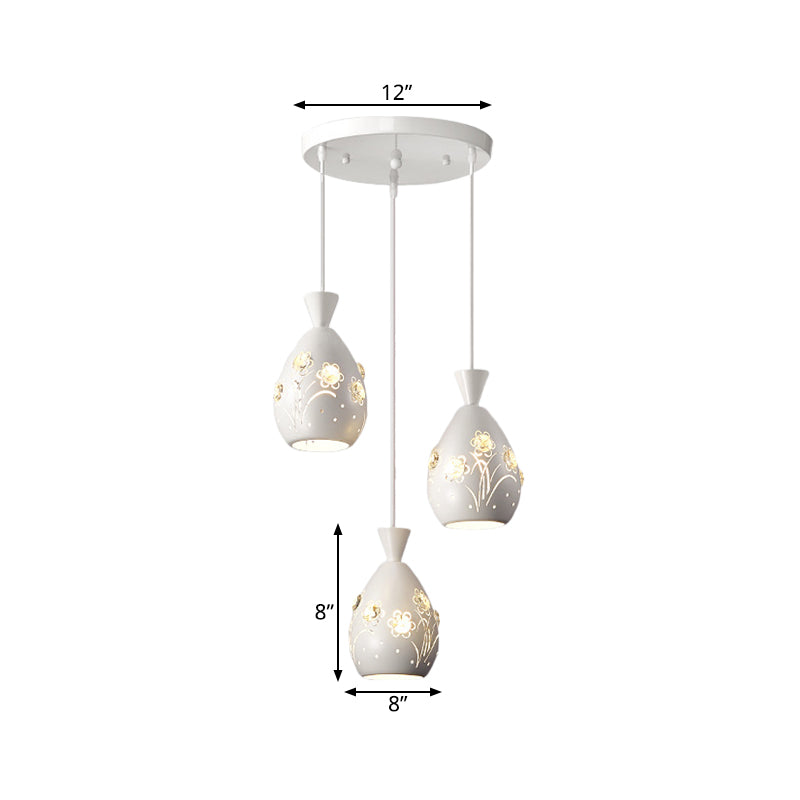 White Wine Can Shape Multi Pendant Modernism 3-Head Iron Hanging Lighting with Laser Cut Flower Design Clearhalo 'Ceiling Lights' 'Modern Pendants' 'Modern' 'Pendant Lights' 'Pendants' Lighting' 897416