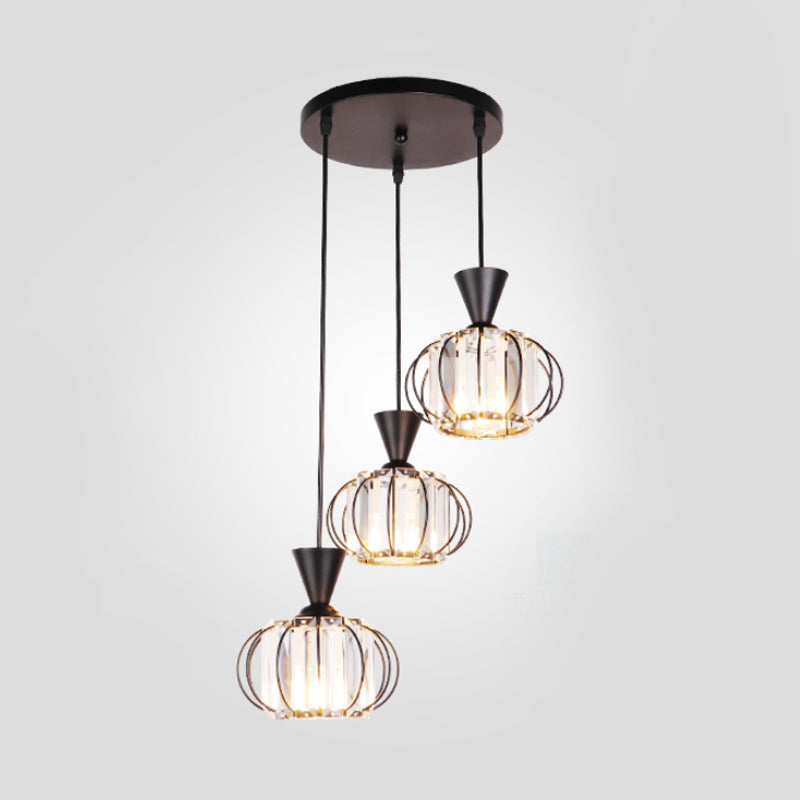 Ellipse Cage Multi Ceiling Lamp Modern Iron 3-Bulb Black Finish Hanging Pendant with Crystal Prisms Shade Inside Clearhalo 'Ceiling Lights' 'Modern Pendants' 'Modern' 'Pendant Lights' 'Pendants' Lighting' 897475