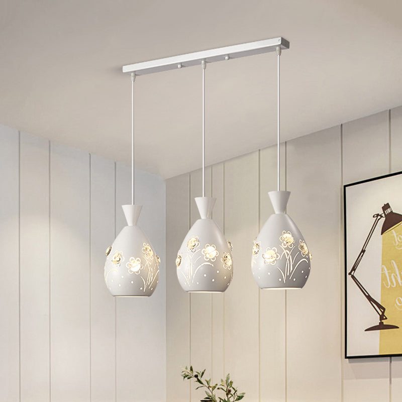 White Cone Multiple Hanging Light Modern 3 Lights Iron Pendulum Lamp with Laser-Cut Floral Design White Clearhalo 'Ceiling Lights' 'Modern Pendants' 'Modern' 'Pendant Lights' 'Pendants' Lighting' 897557