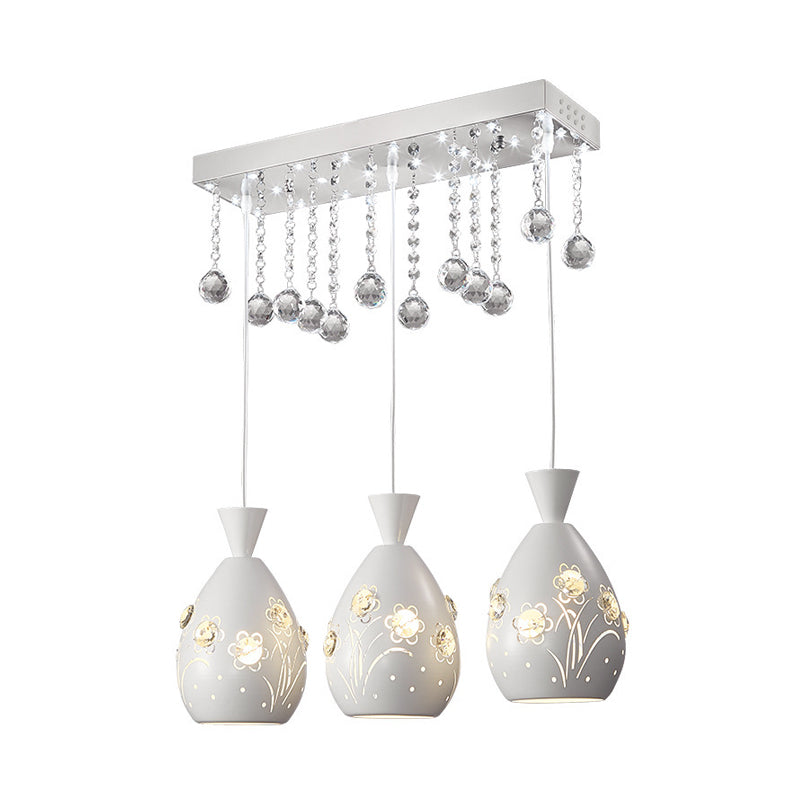 Hollow-Out Floret Iron Multi Light Ceiling Lamp Modern 3-Light White Hanging Pendant with Crystal Droplet Clearhalo 'Ceiling Lights' 'Modern Pendants' 'Modern' 'Pendant Lights' 'Pendants' Lighting' 897590