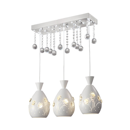 Hollow-Out Floret Iron Multi Light Ceiling Lamp Modern 3-Light White Hanging Pendant with Crystal Droplet Clearhalo 'Ceiling Lights' 'Modern Pendants' 'Modern' 'Pendant Lights' 'Pendants' Lighting' 897590