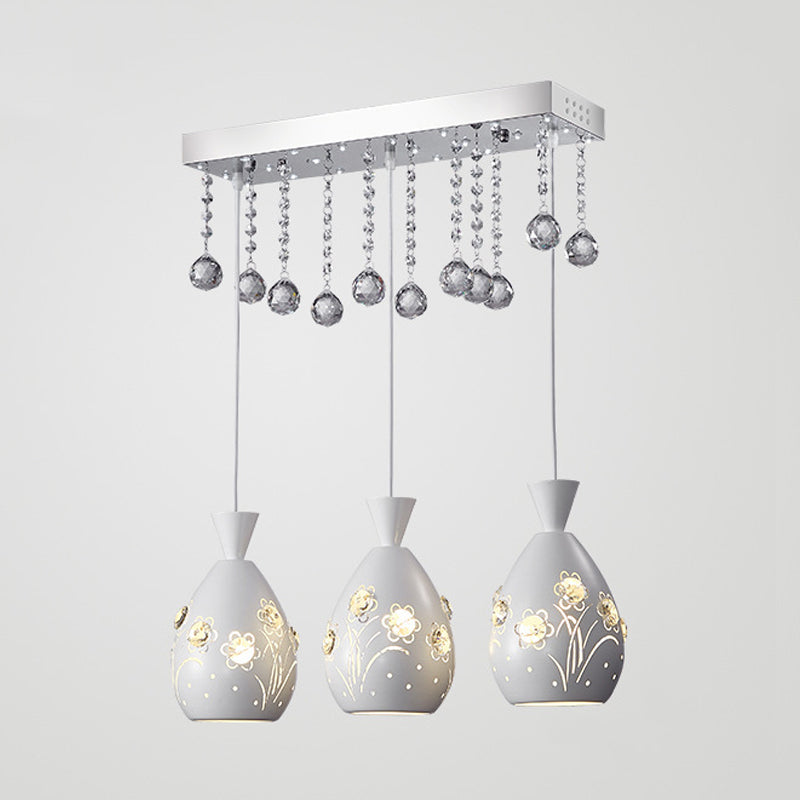 Hollow-Out Floret Iron Multi Light Ceiling Lamp Modern 3-Light White Hanging Pendant with Crystal Droplet Clearhalo 'Ceiling Lights' 'Modern Pendants' 'Modern' 'Pendant Lights' 'Pendants' Lighting' 897591