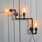 3 Heads Wall Light Sconce with Open Bulb and Pipe Metallic Industrial Style Restaurant Wall Mount Light in Black Black Clearhalo 'Art deco wall lights' 'Cast Iron' 'Glass' 'Industrial wall lights' 'Industrial' 'Middle century wall lights' 'Modern' 'Rustic wall lights' 'Tiffany' 'Traditional wall lights' 'Wall Lamps & Sconces' 'Wall Lights' Lighting' 90648