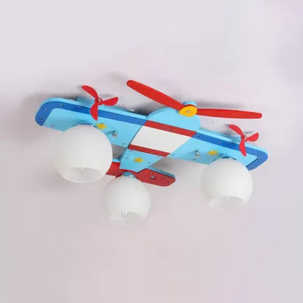 Propeller Airplane Nursing Room Ceiling Light Wood Glass 3 Lights Cute Flush Mount Light in Blue Clearhalo 'Ceiling Lights' 'Close To Ceiling Lights' 'Close to ceiling' 'Flush mount' Lighting' 92146