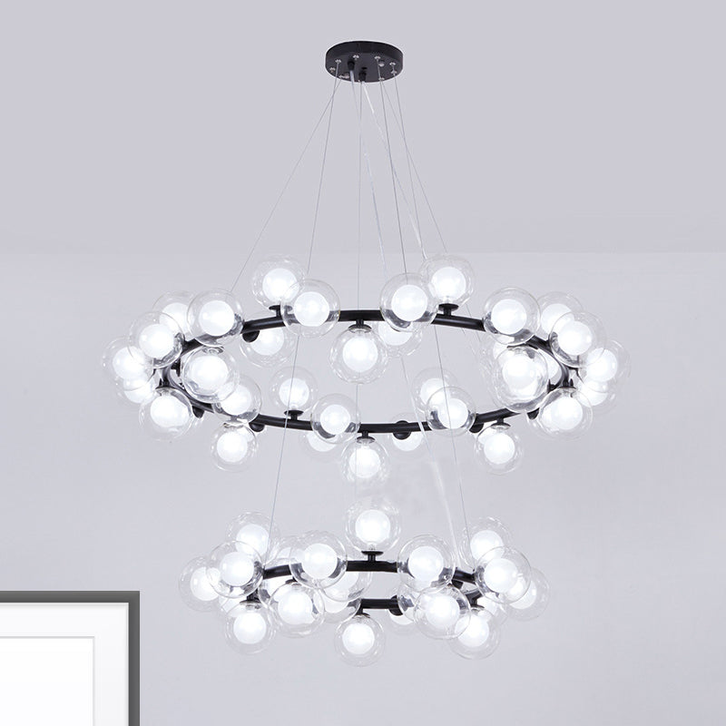 Bubble Chandelier Light Contemporary Clear Glass 2/3 Tiers Black Finish Hanging Lamp with Metal Ring for Living Room Clearhalo 'Ceiling Lights' 'Chandeliers' 'Glass shade' 'Glass' 'Modern Chandeliers' 'Modern' Lighting' 926404