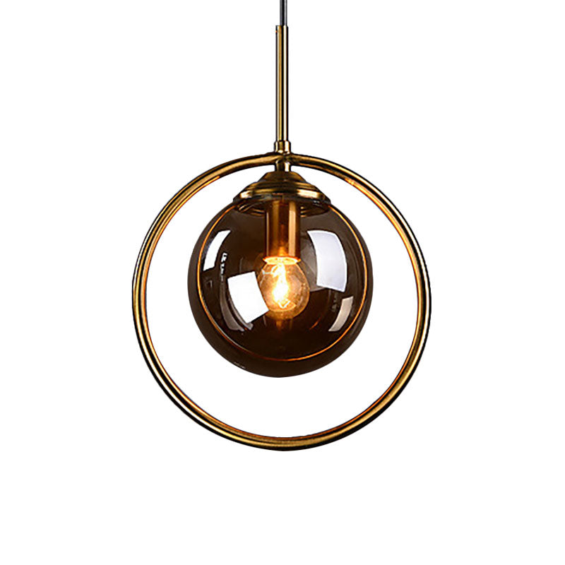 Amber/Smoke/Clear Glass Ball Pendant Lighting Post-Modernist 1 Light Ceiling Hung Fixture with Ring Frame Clearhalo 'Ceiling Lights' 'Glass shade' 'Glass' 'Modern Pendants' 'Modern' 'Pendant Lights' 'Pendants' Lighting' 961880