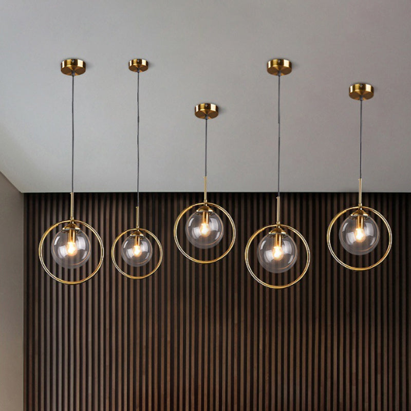 Amber/Smoke/Clear Glass Ball Pendant Lighting Post-Modernist 1 Light Ceiling Hung Fixture with Ring Frame Clearhalo 'Ceiling Lights' 'Glass shade' 'Glass' 'Modern Pendants' 'Modern' 'Pendant Lights' 'Pendants' Lighting' 961883