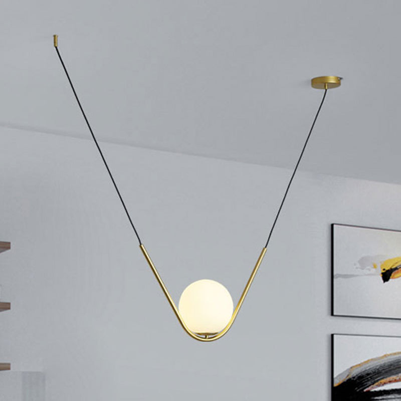 Gold Ball Pendant Light Post Modern Led White Glass Hanging Lamp with V Shape Rod for Dining Room Clearhalo 'Ceiling Lights' 'Glass shade' 'Glass' 'Modern Pendants' 'Modern' 'Pendant Lights' 'Pendants' Lighting' 961889