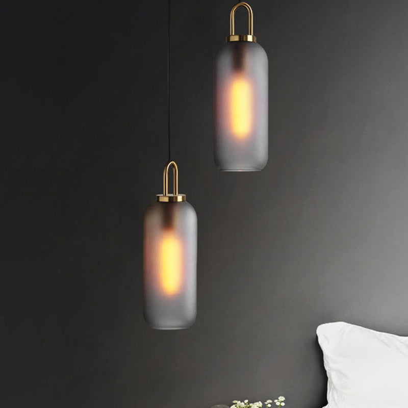 1 Light Dining Room Pendant Light with Cylindrical Clear/Smoky Glass Shade Post-Modern Hanging Lamp Kit, 5"/6" Wide Smoke Gray Clearhalo 'Ceiling Lights' 'Glass shade' 'Glass' 'Modern Pendants' 'Modern' 'Pendant Lights' 'Pendants' Lighting' 961890