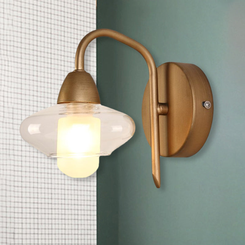Brass Elliptical Sconce Lighting Modernist 1 Light Clear Glass Led Wall Mounted Light Clearhalo 'Cast Iron' 'Glass' 'Industrial' 'Modern wall lights' 'Modern' 'Tiffany' 'Traditional wall lights' 'Wall Lamps & Sconces' 'Wall Lights' Lighting' 961894