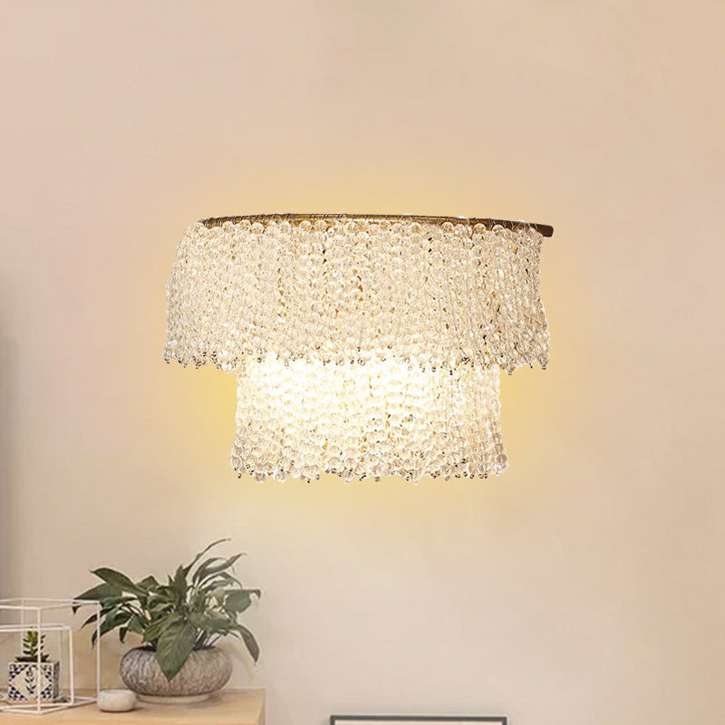 Crystal Bead Strand 2-Layer Sconce Lamp Modernism 2 Lights Bedside Wall Lighting in Gold Clearhalo 'Cast Iron' 'Glass' 'Industrial' 'Modern wall lights' 'Modern' 'Tiffany' 'Traditional wall lights' 'Wall Lamps & Sconces' 'Wall Lights' Lighting' 963578