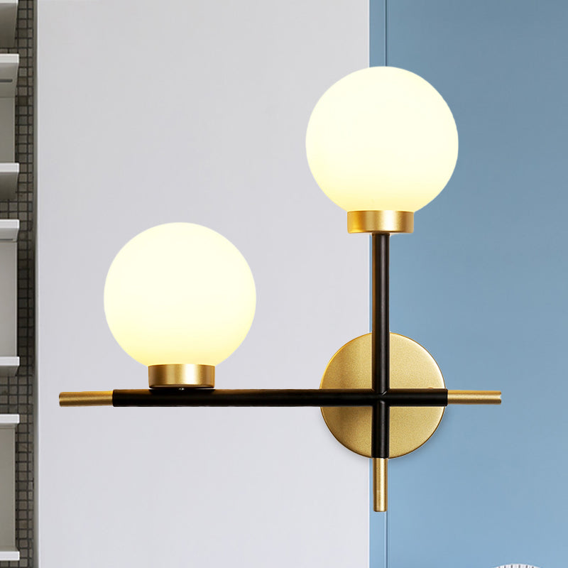 2-Bulb Milky Glass Sconce Light Fixture Modern Black Double Globe Living Room Wall Lamp with Cross Design Clearhalo 'Cast Iron' 'Glass' 'Industrial' 'Modern wall lights' 'Modern' 'Tiffany' 'Traditional wall lights' 'Wall Lamps & Sconces' 'Wall Lights' Lighting' 968929