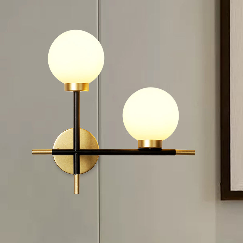 2-Bulb Milky Glass Sconce Light Fixture Modern Black Double Globe Living Room Wall Lamp with Cross Design Clearhalo 'Cast Iron' 'Glass' 'Industrial' 'Modern wall lights' 'Modern' 'Tiffany' 'Traditional wall lights' 'Wall Lamps & Sconces' 'Wall Lights' Lighting' 968930